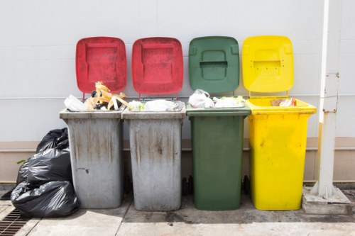 Construction site with waste segregation containers in Uxbridge